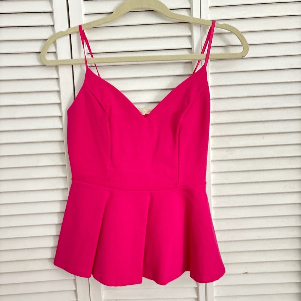 Pink peplum top